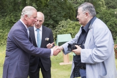 BRITAIN London 13/07/2017HRH The Prince of Wales with the Shire Horses of Operation Centaur at the launch of the Royal Parks Charity Pictured: Prince Charles is introduced to Daily Express photographer Paul Stewart who wrote the book The Last Herd about the Royal Parks Shire horses©Vivien Stewart 2016@@PS_HRH1029.JPG